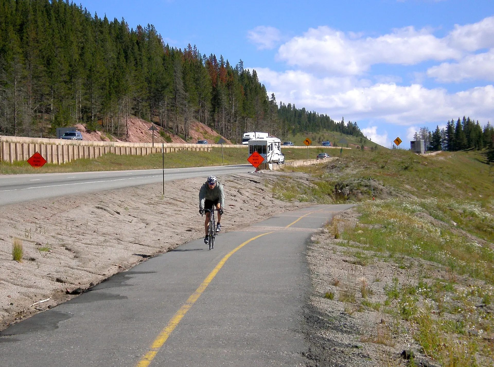 A cyclist on the paved Vail Pass bike path
